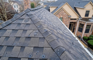 Hail damage on a roof can look different from one home to another. During an inspection, a roofing professional may look for: Bruised shingles: Soft or spongy areas that may indicate impact beneath the shingle surface. Impact-related granule loss: Localized areas where hail knocked granules loose. Cracked or split shingles: Visible breaks that may affect the roof’s ability to shed water. Dented flashing or vents: Metal components that can provide useful storm context. Interior changes: New ceiling stains, damp insulation, or water entering the home after a storm. Do not climb onto your roof to check for these signs. It is safer to inspect what you can see from the ground and schedule a professional inspection.
